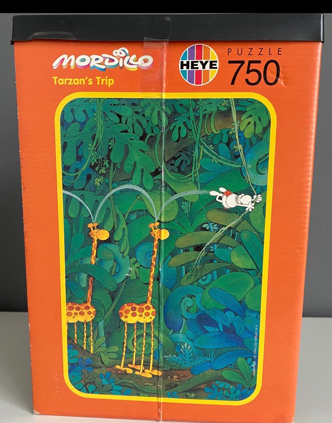 Heye Puzzel Tarzans Trip Mordillo 750 stukjes, Ophalen of Verzenden, 500 t/m 1500 stukjes, Zo goed als nieuw, Legpuzzel