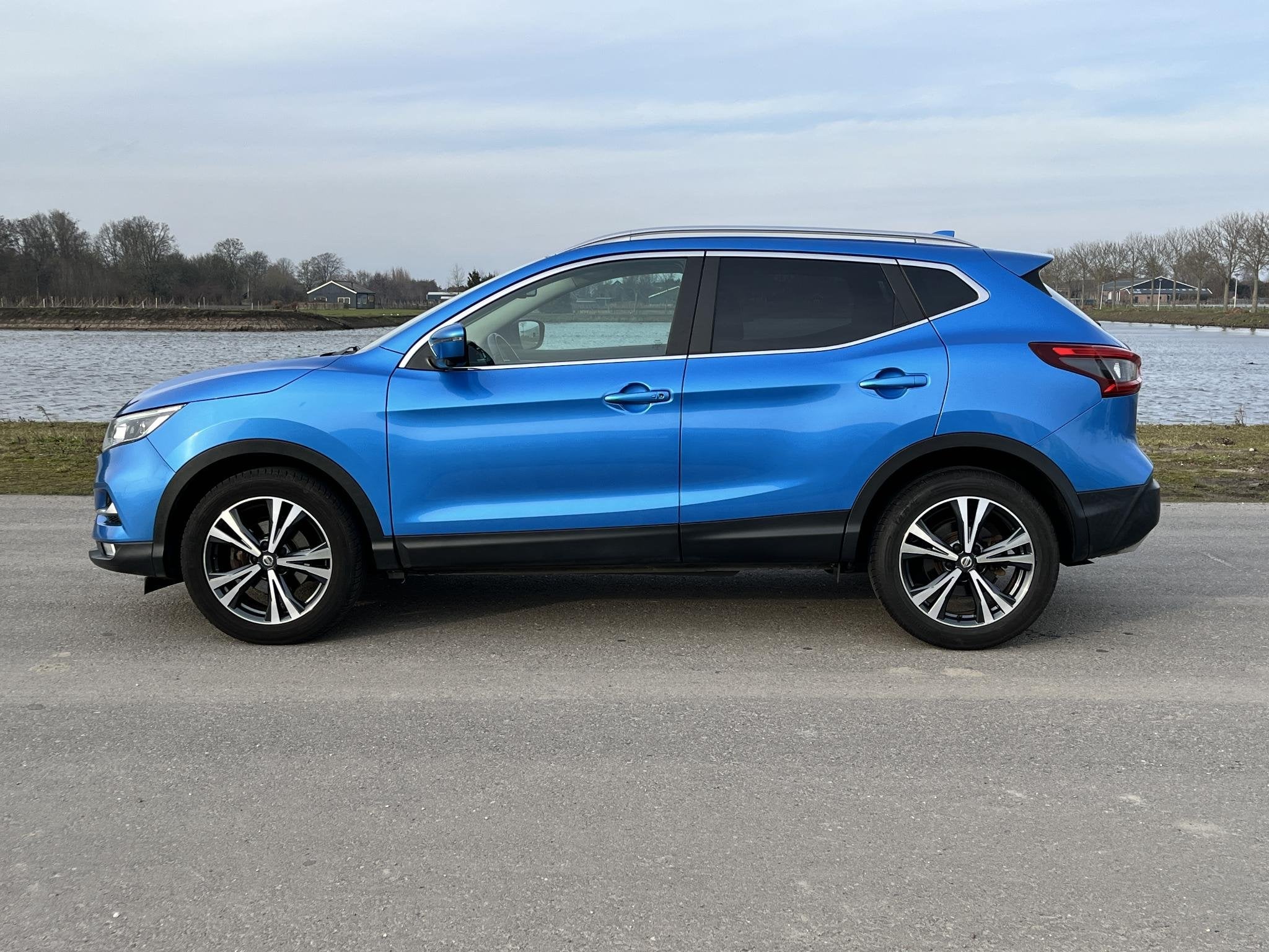 Nissan Qashqai 1.2 Tekna pano, 360 camera, Auto's, Stof, Gebruikt, 4 cilinders, Blauw