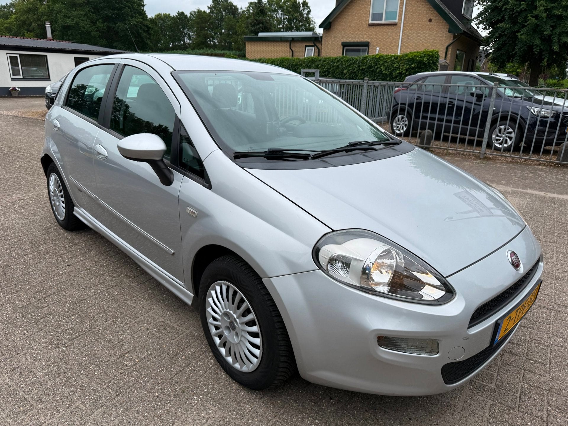 Fiat Punto Evo 0.9 TwinAir 5-DRS Street AIRCO NAVI CRUISE BL, Auto's, Voorwielaandrijving, Gebruikt, Euro 6, 49 €/maand
