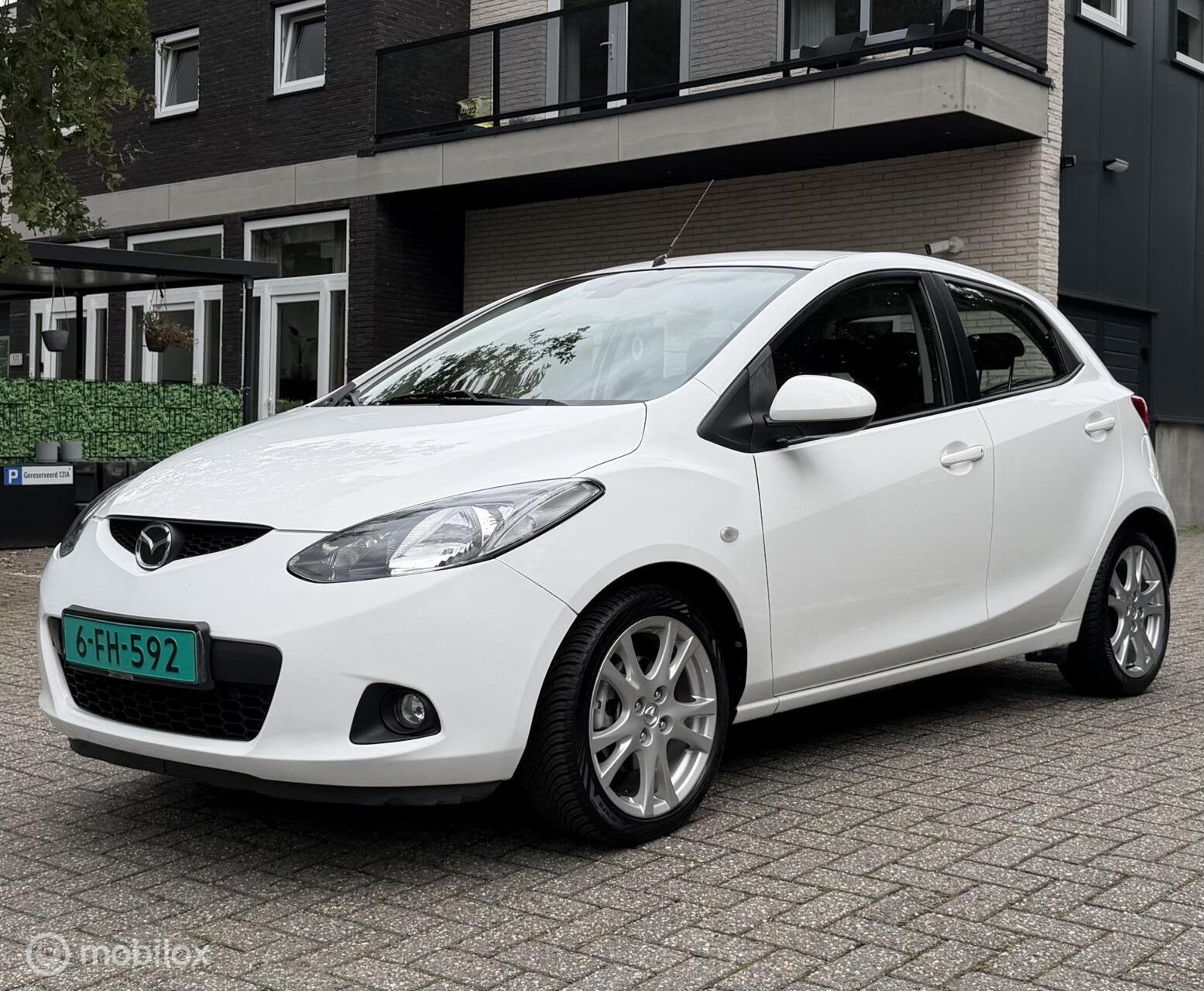 Mazda 2 1.3hp S-VT Touring Elektrische pakket Airco Apk 5D, Voorwielaandrijving, 86 pk, Gebruikt, 31 €/maand