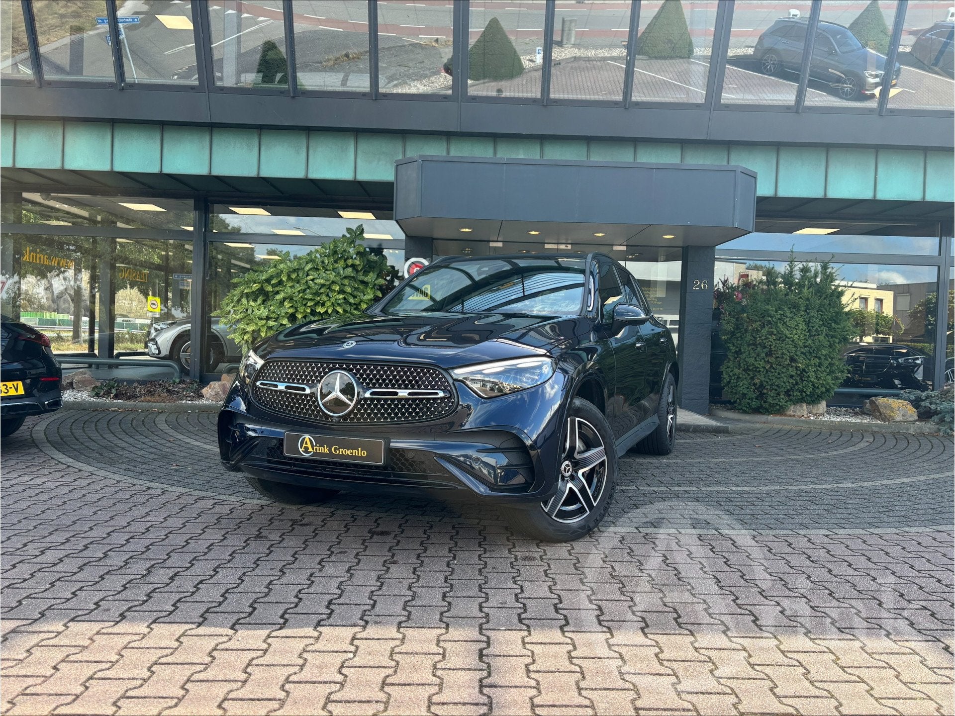 Mercedes-Benz GLC 300e 4MATIC AMG Line Panoramadak, Rijassis, Auto's, Automaat, 12 maanden, Gebruikt, Blauw