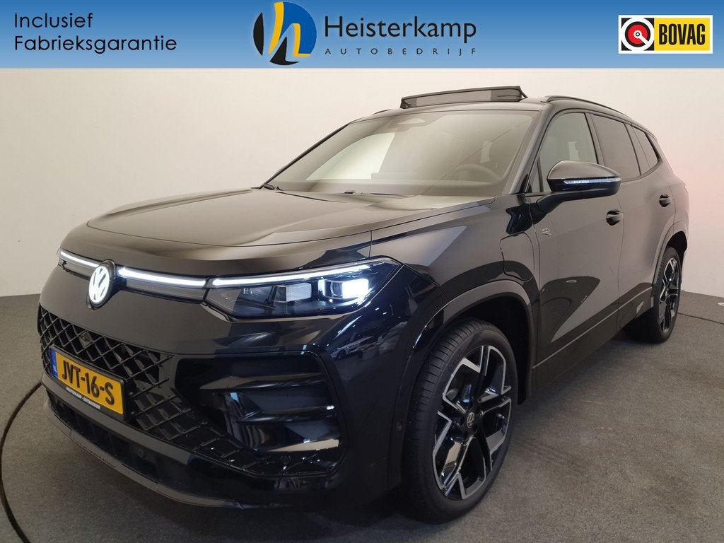 Volkswagen Tayron 1.5 eHybrid 272pk DSG/AUT R-Line Wegklapba, Auto's, Volkswagen, 12 maanden, 4 cilinders, 1848 kg, Zwart