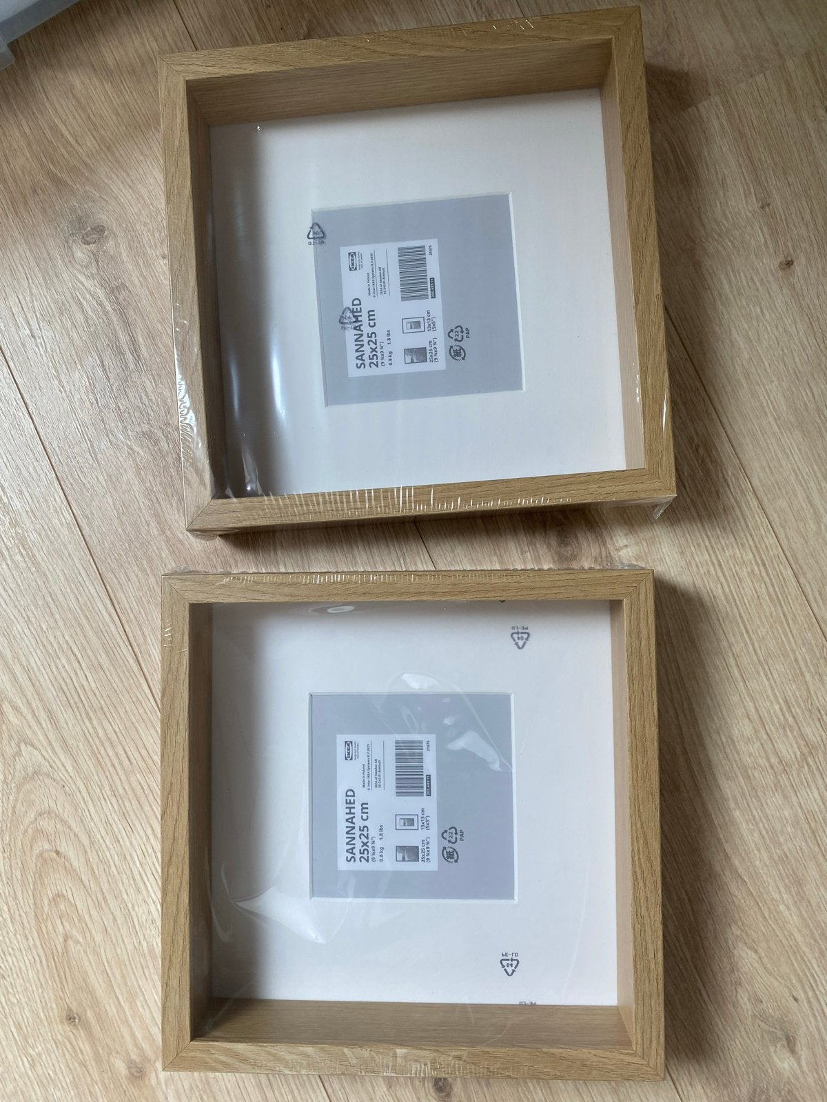 2x IKEA SANNAHED Lijst 25x25 cm - Nieuw en Ongebruikt, Huis en Inrichting, Woonaccessoires | Lijsten, Ophalen, Fotolijst, Hangend