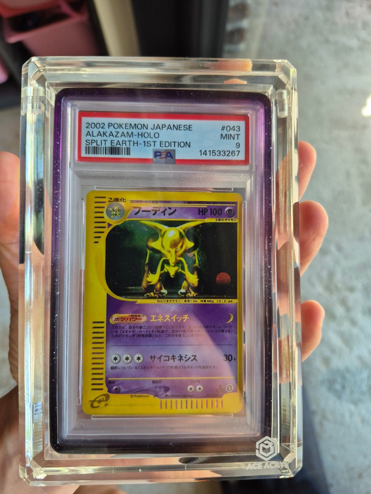 Pokémon alakazam holo 1st edition split earth japanese PSA 9, Ophalen of Verzenden