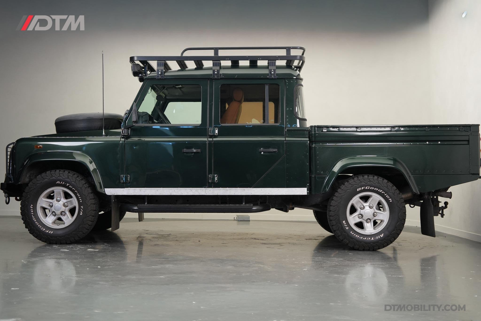 Land Rover Defender 2.5 Td5 130" Crew Cab | Verstralers | Le, Auto's, Stof, Gebruikt, Beige, 2495 cc