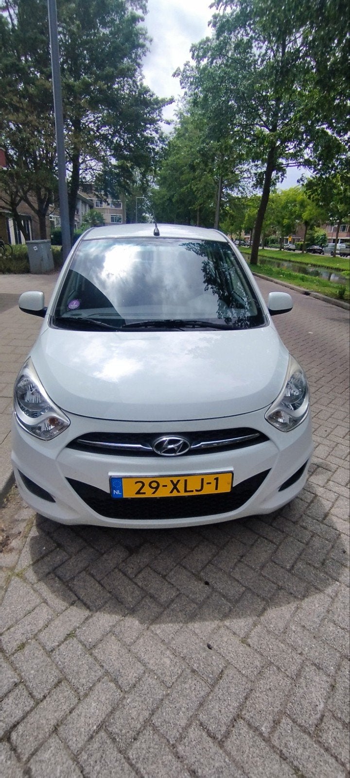 Hyundai i10 1.1 I 5DR 2012 Wit, Auto's, 4 cilinders, 400 kg, Wit, Origineel Nederlands