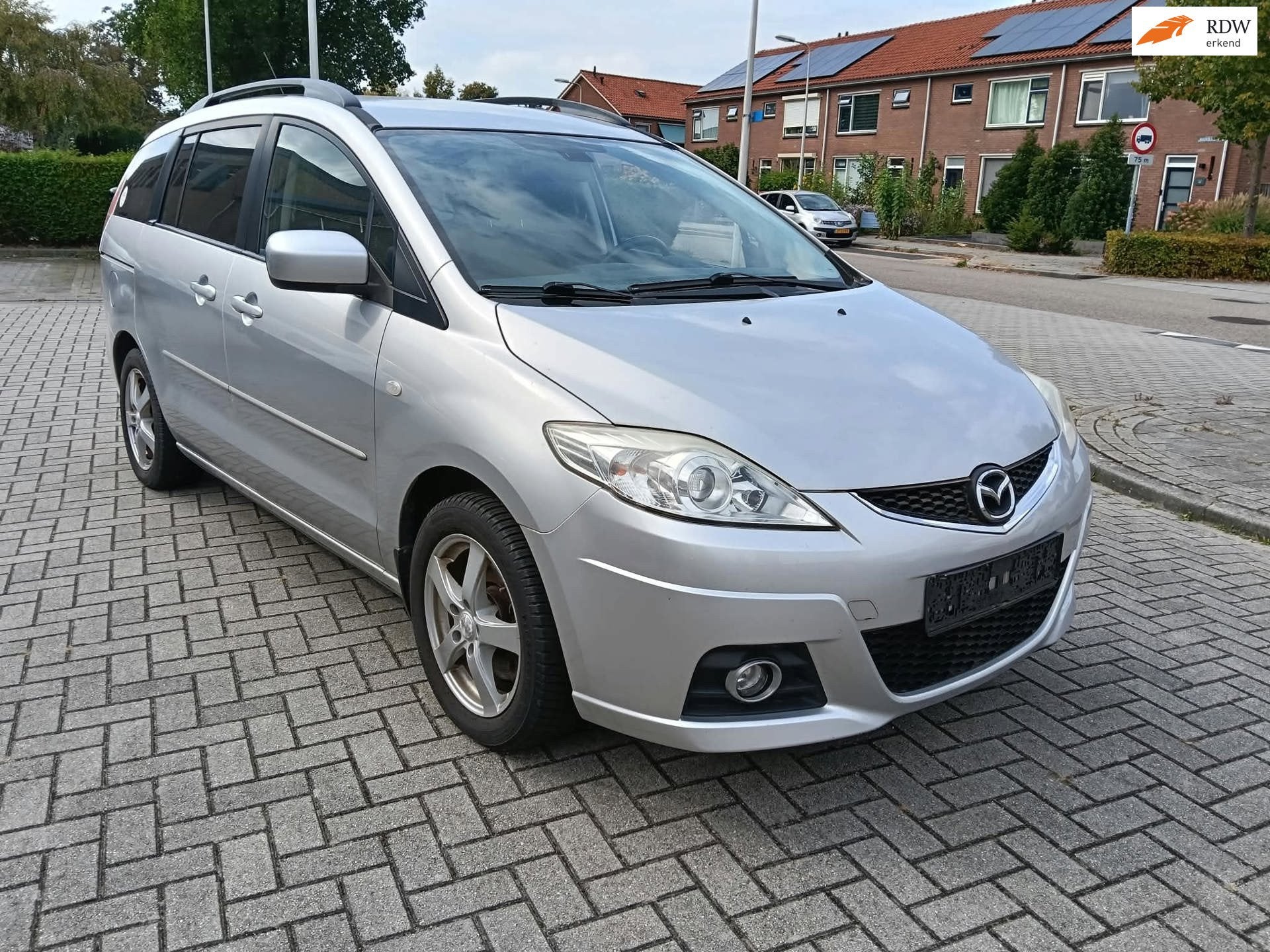 Mazda 5 2.0 Business, Auto's, Gebruikt, Zwart, 7 stoelen, Bedrijf