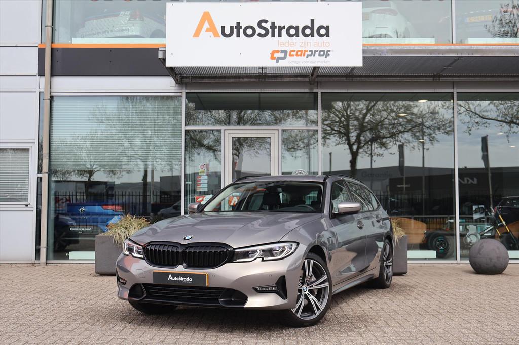 BMW 3-Serie Touring (g21) 330e High Executive 292pk | Leder, 1998 cc, Gebruikt, 4 cilinders, Met garantie (alle)