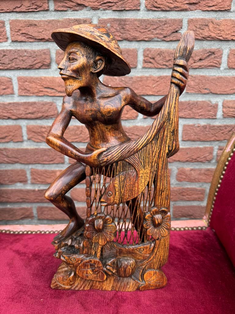 stoere visserman, houtsnijwerk uit Bali, Houtsnijwerk, Art deco, Ophalen of Verzenden, Handgemaakt