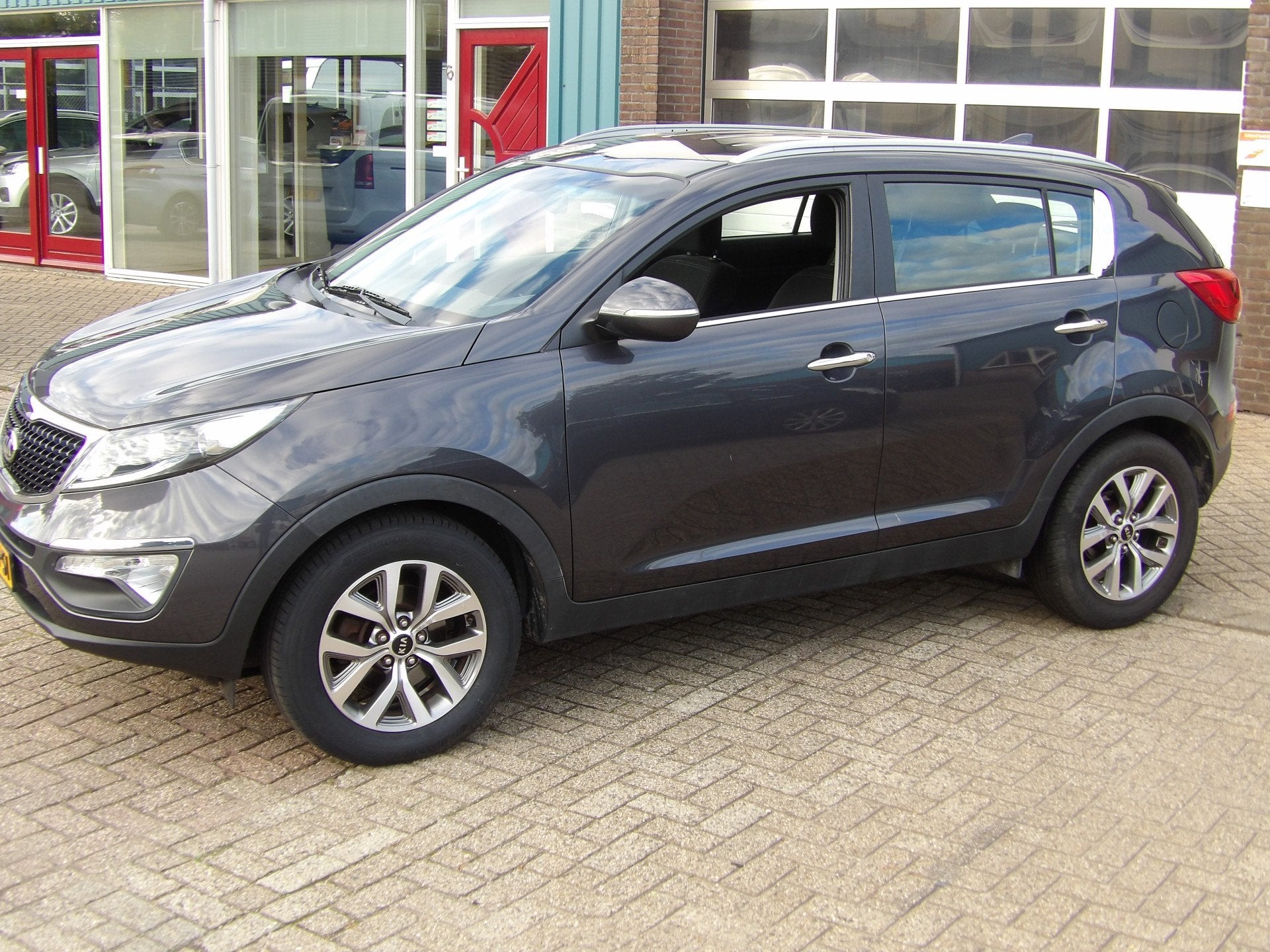 Kia Sportage 1.6 GDI BusinessLine (bj 2014), Auto's, Voorwielaandrijving, Euro 5, 135 pk, 1591 cc