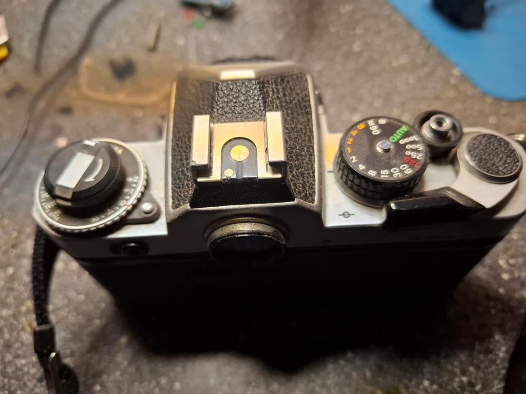 Nikon FE spiegelreflexcamera met 50mm f/1.8 lens, Audio, Tv en Foto, Fotocamera's Analoog, Ophalen of Verzenden, Gebruikt, Spiegelreflex