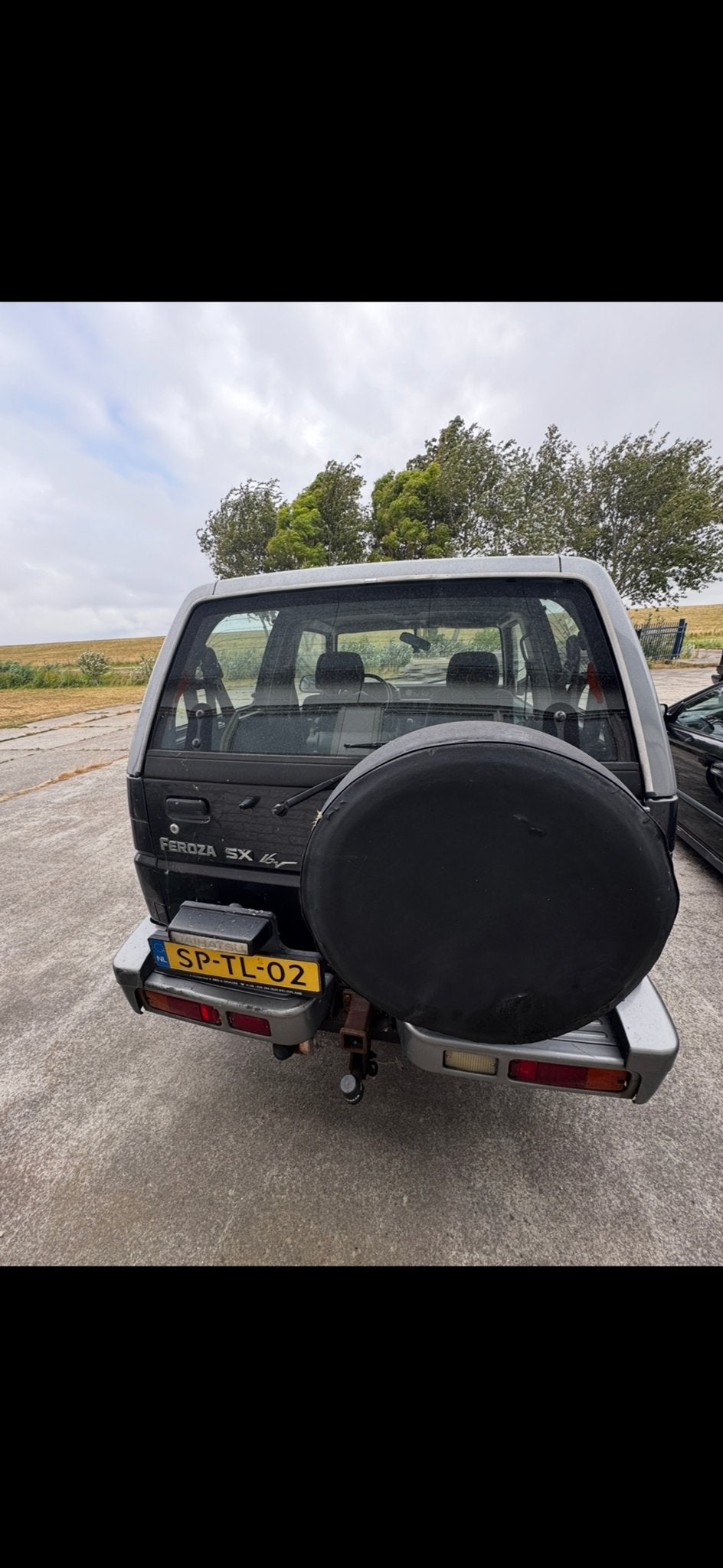 Daihatsu Feroza 1.6 I Resintop 4WD 1997 Grijs, Auto's, Feroza, 1590 cc, Origineel Nederlands, Handgeschakeld