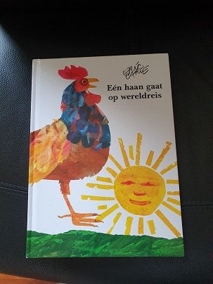 EËN  HAAN  GAAT  OP  WERELDREIS  van Eric Carle  , Ophalen of Verzenden, Gelezen, Fictie algemeen