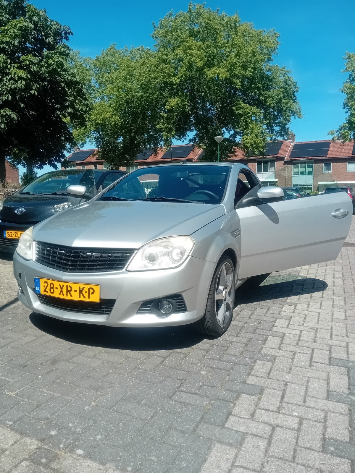 Opel Tigra 1.4 16V Twintop 2007 Grijs 165000km nap, Voorwielaandrijving, 4 cilinders, Cabriolet, 49 €/maand