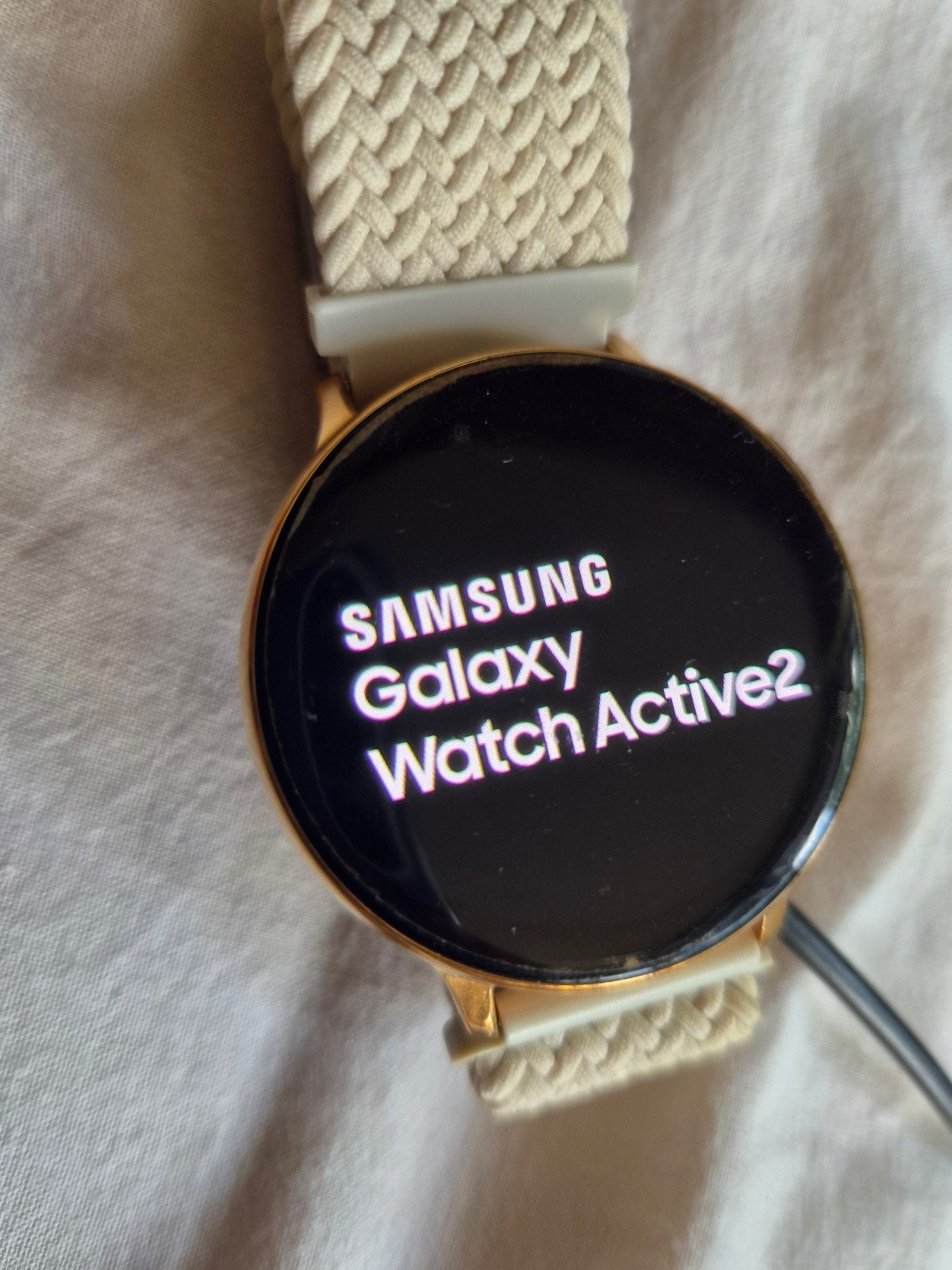 Samsung Galaxy Watch Active2 - Roségoud met stoffen band, Ophalen of Verzenden, Zo goed als nieuw, Samsung, Afstand