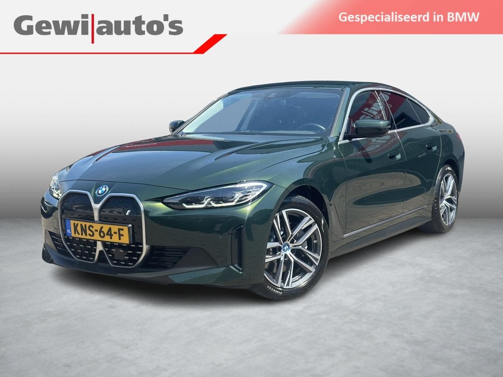 BMW i4 eDrive35 70 kWh, Auto's, BMW, Achterwielaandrijving, Gebruikt, Zwart, Leder en Stof