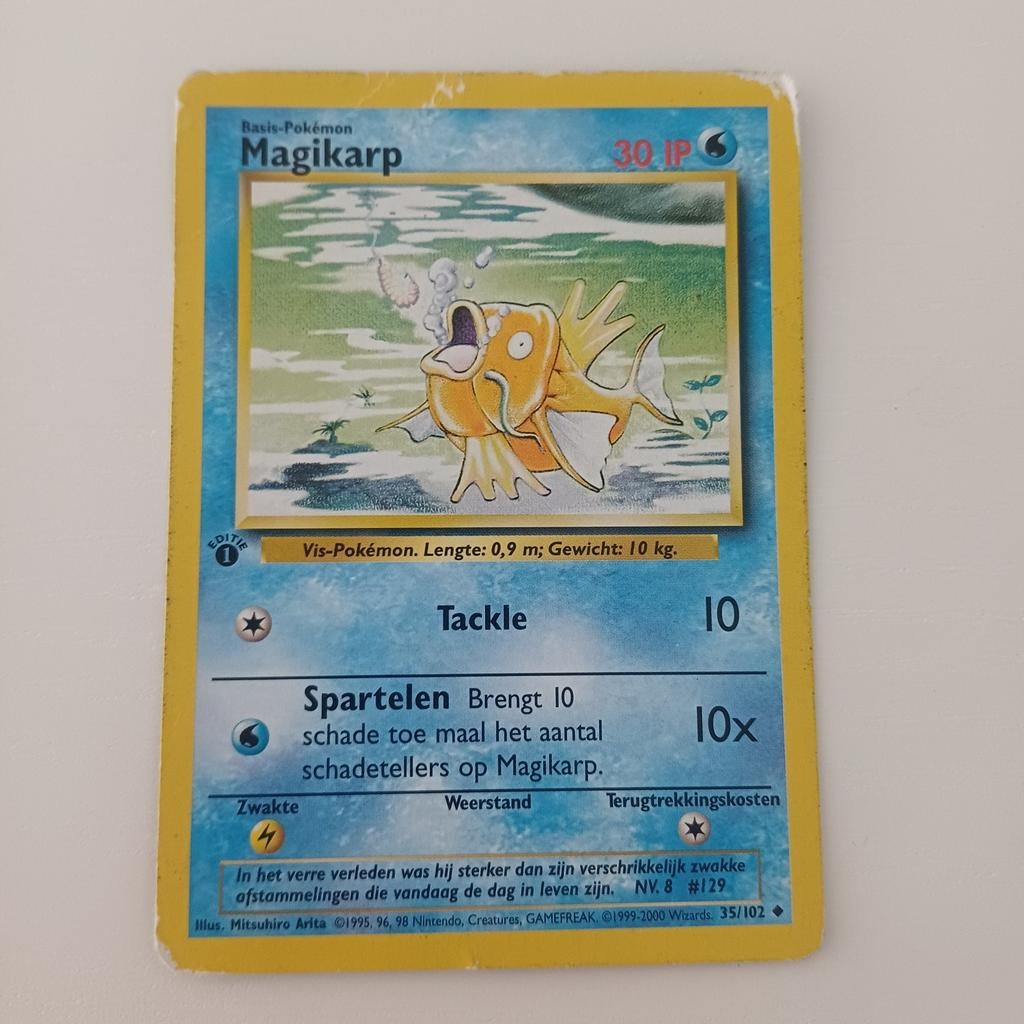 First edition base set magikarp, Ophalen of Verzenden, Zo goed als nieuw