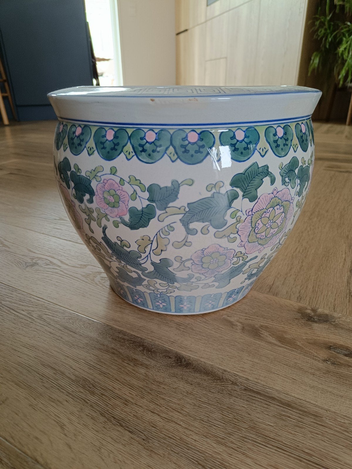 Grote Chinese bloempot, Ophalen