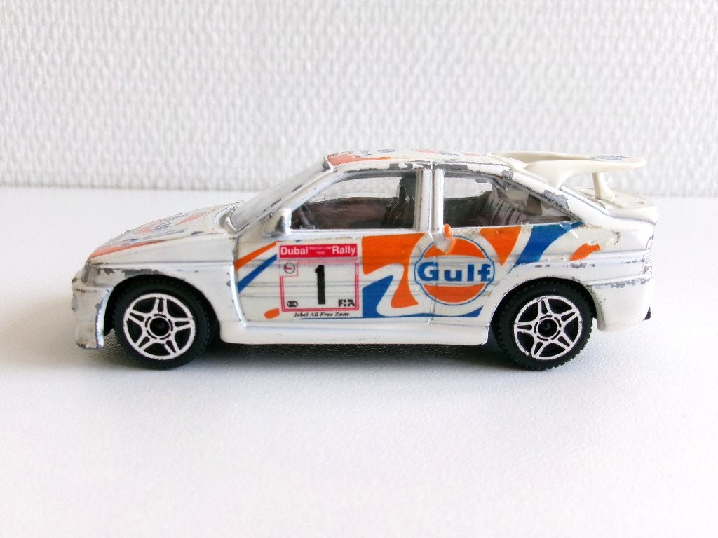 Ford Escort RS Cosworth wit 1:43 Bburago (geen ovp), Hobby en Vrije tijd, Modelauto's | 1:43, Ophalen of Verzenden, Gebruikt, Auto