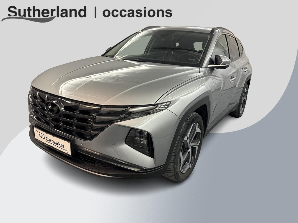 Hyundai Tucson 1.6 T-GDI PHEV Premium 4WD 32300 KM | Lederen, Auto's, Hyundai, Automaat, 14 kWh, Gebruikt, Euro 6