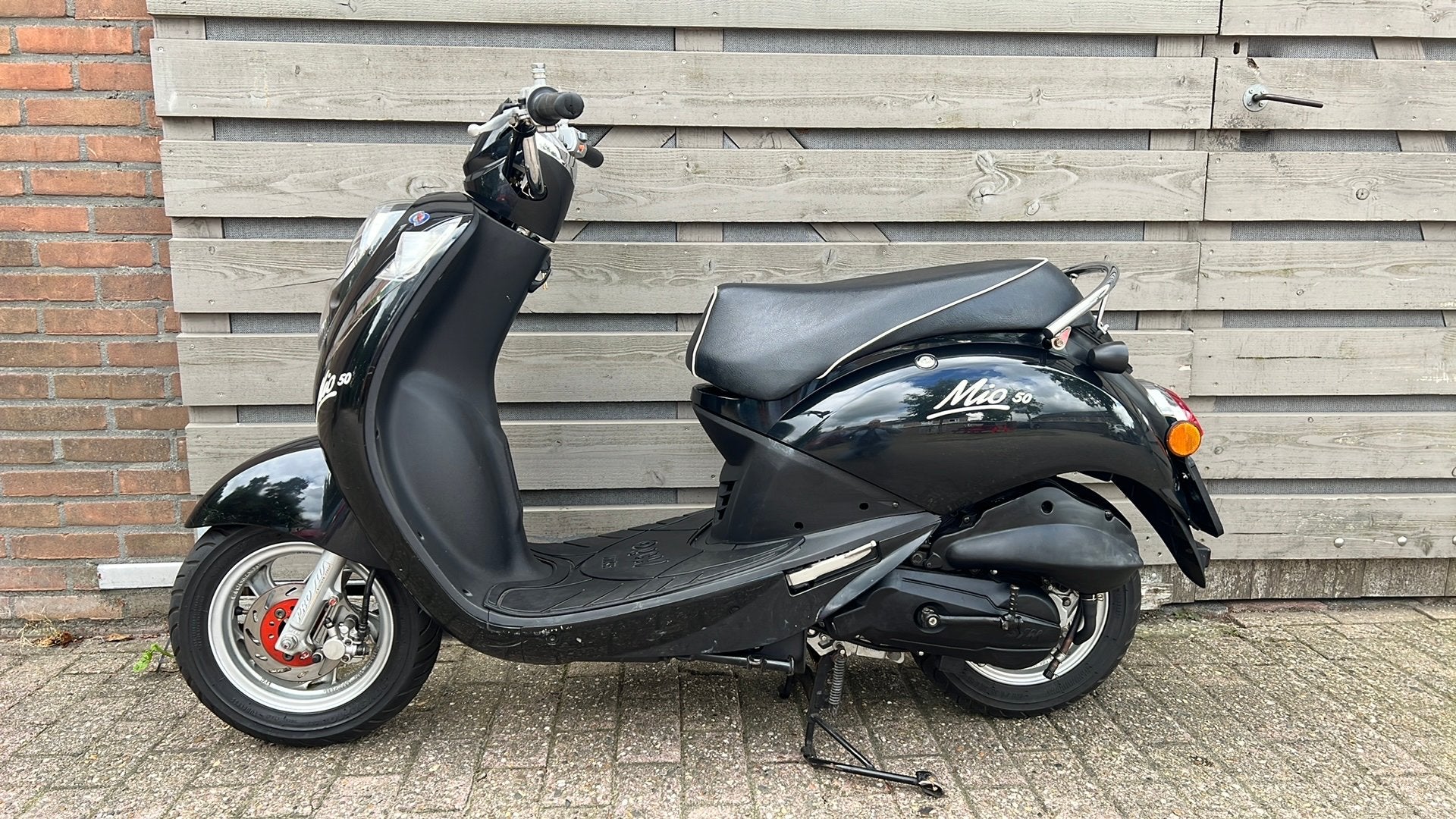 Sym Mio brom 8999km! Netjes!, Ophalen, Zo goed als nieuw, Benzine, Mio