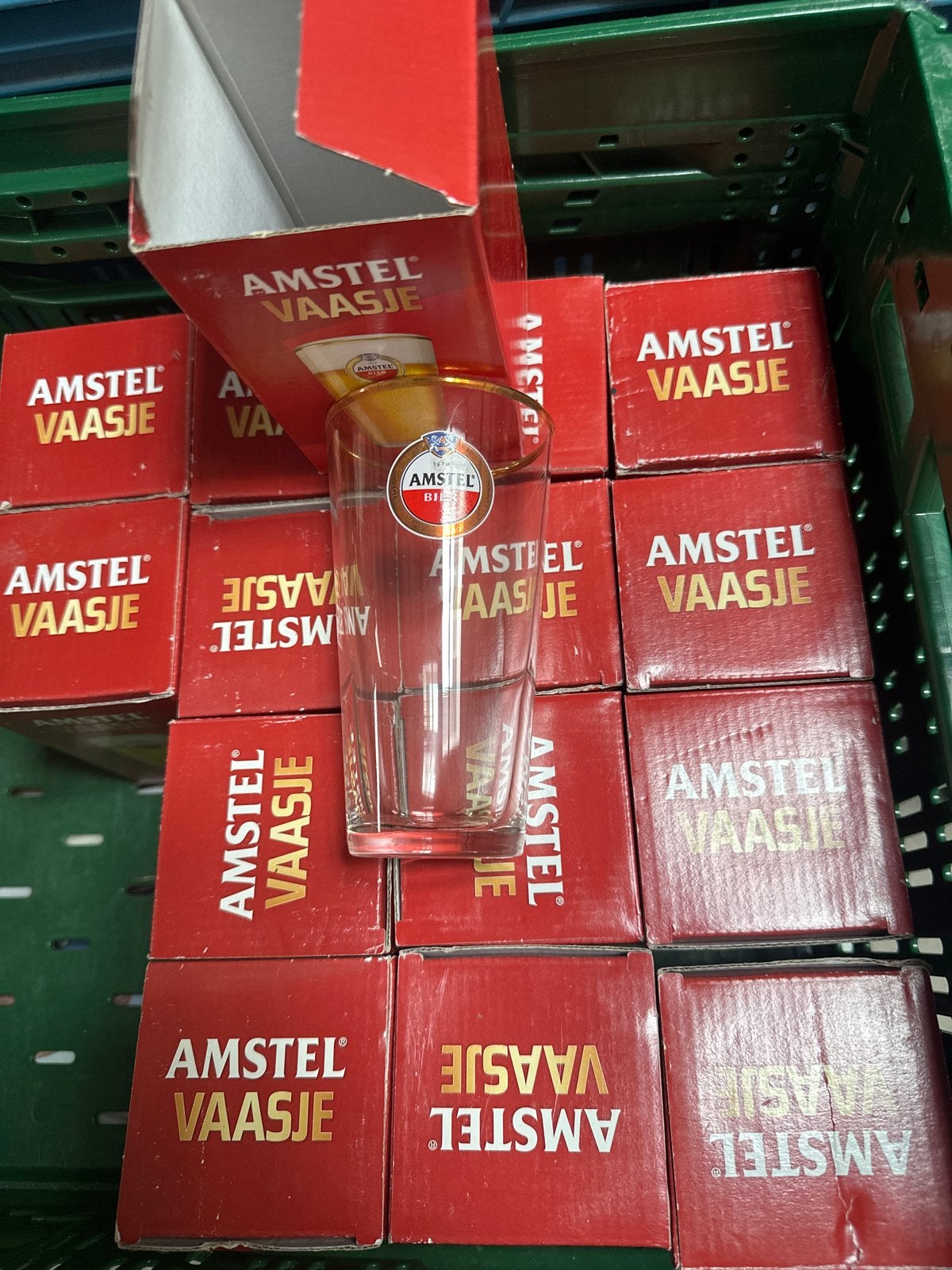 12 Amstel vaasjes - Nieuw in doos, Ophalen of Verzenden, Nieuw, Transparant, Glas