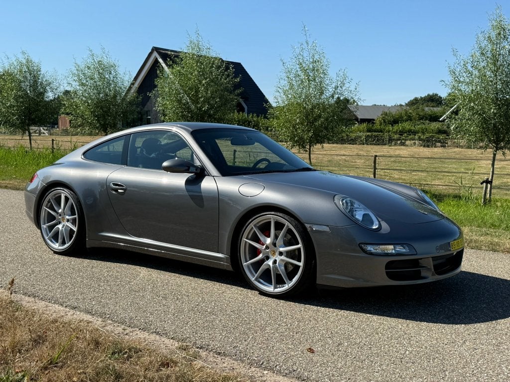 Porsche 911 997 3.6 Carrera 4 2007 handgeschakeld!, Zwart, Parkeersensor, Vierwielaandrijving, 2 stoelen