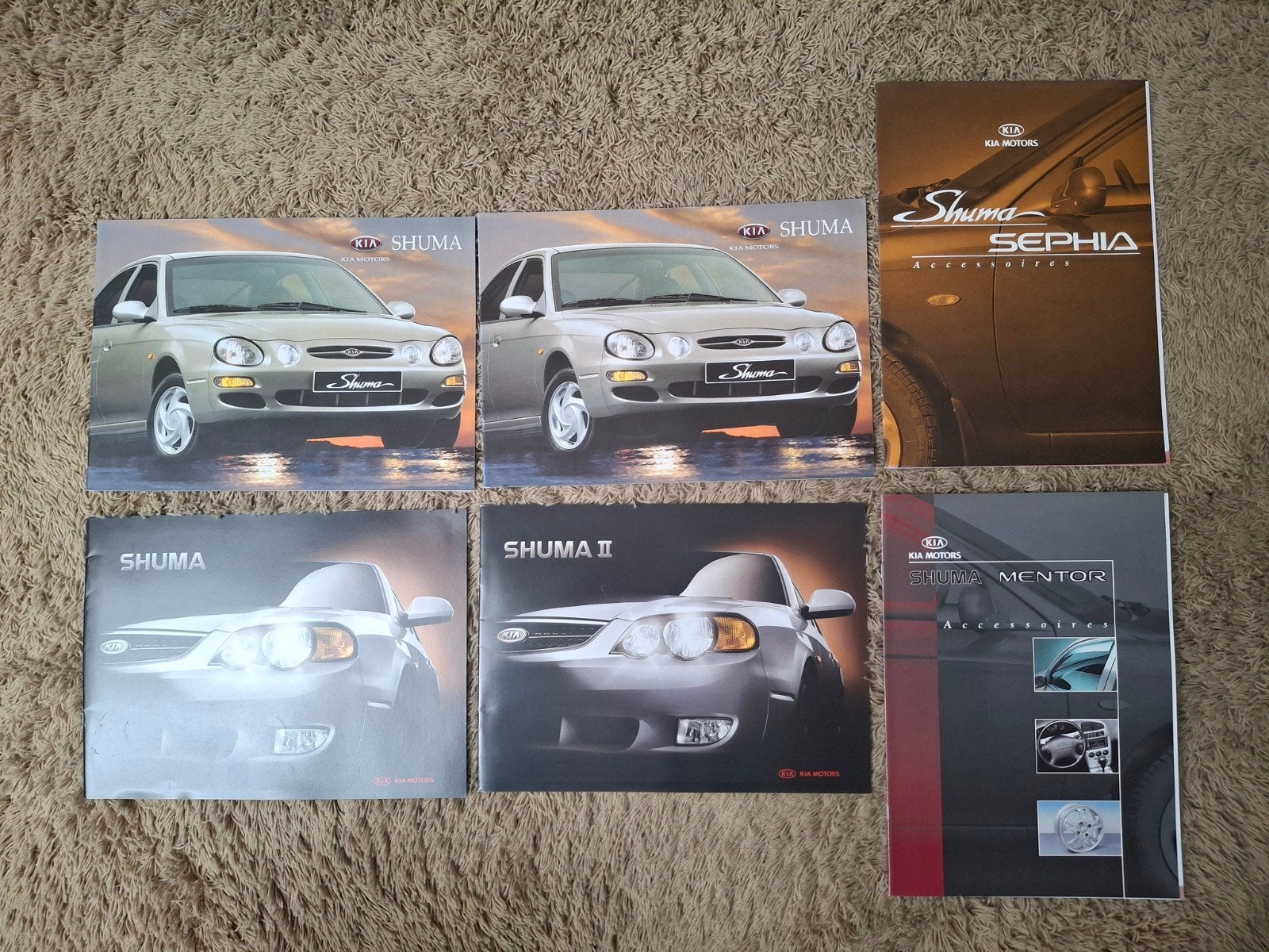 Lot autofolders Kia Shuma, Verzenden, Gelezen, Algemeen