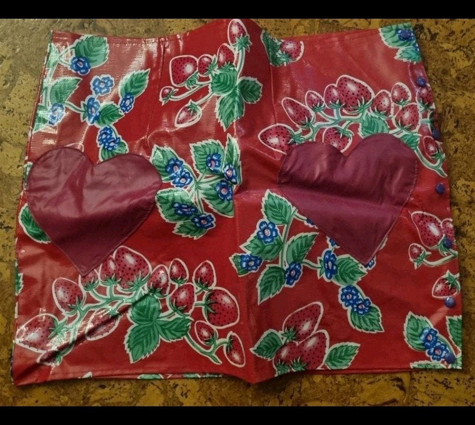 Plastic tafelkleed rokje met drukknopen L 
Maat L 42, Ophalen of Verzenden, Zo goed als nieuw, Maat 42/44 (L), Carnaval