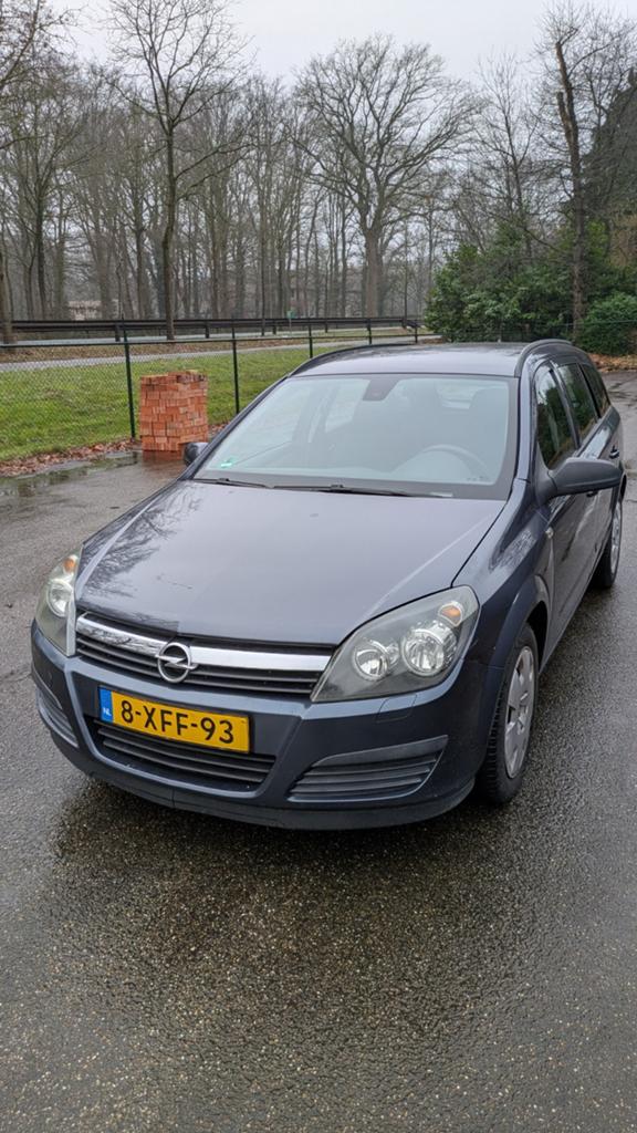 Opel Astra 1.4 16V St.wgn. 2007 Blauw, Auto's, Opel, Voorwielaandrijving, 4 cilinders, Blauw, Stationwagon