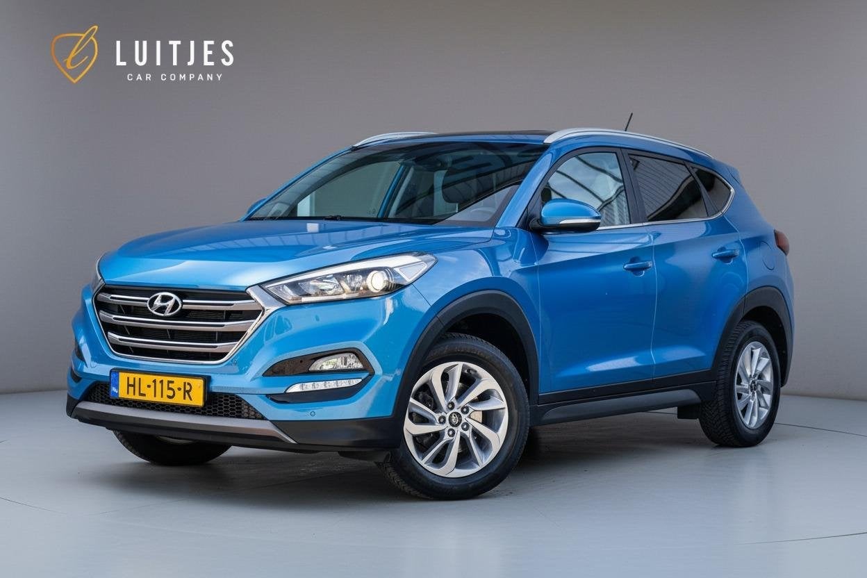 Hyundai Tucson 1.6 GDi Comfort OrgNL|Camera|Navi|Stoelverw.|, Auto's, Voorwielaandrijving, Dealer onderhouden, Stof, Gebruikt