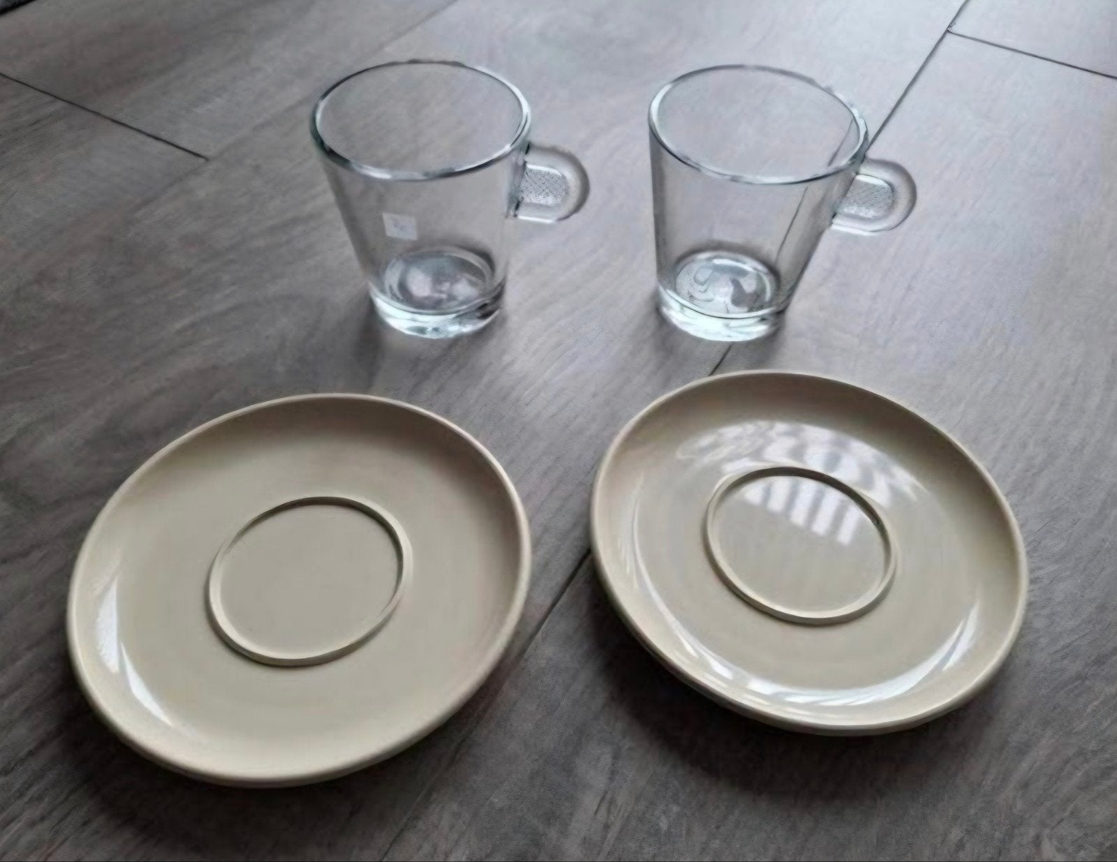 Nespresso koffiekopjes met schotels - 2 sets, Ophalen, Overige stijlen, Kop(pen) en/of Schotel(s), Glas