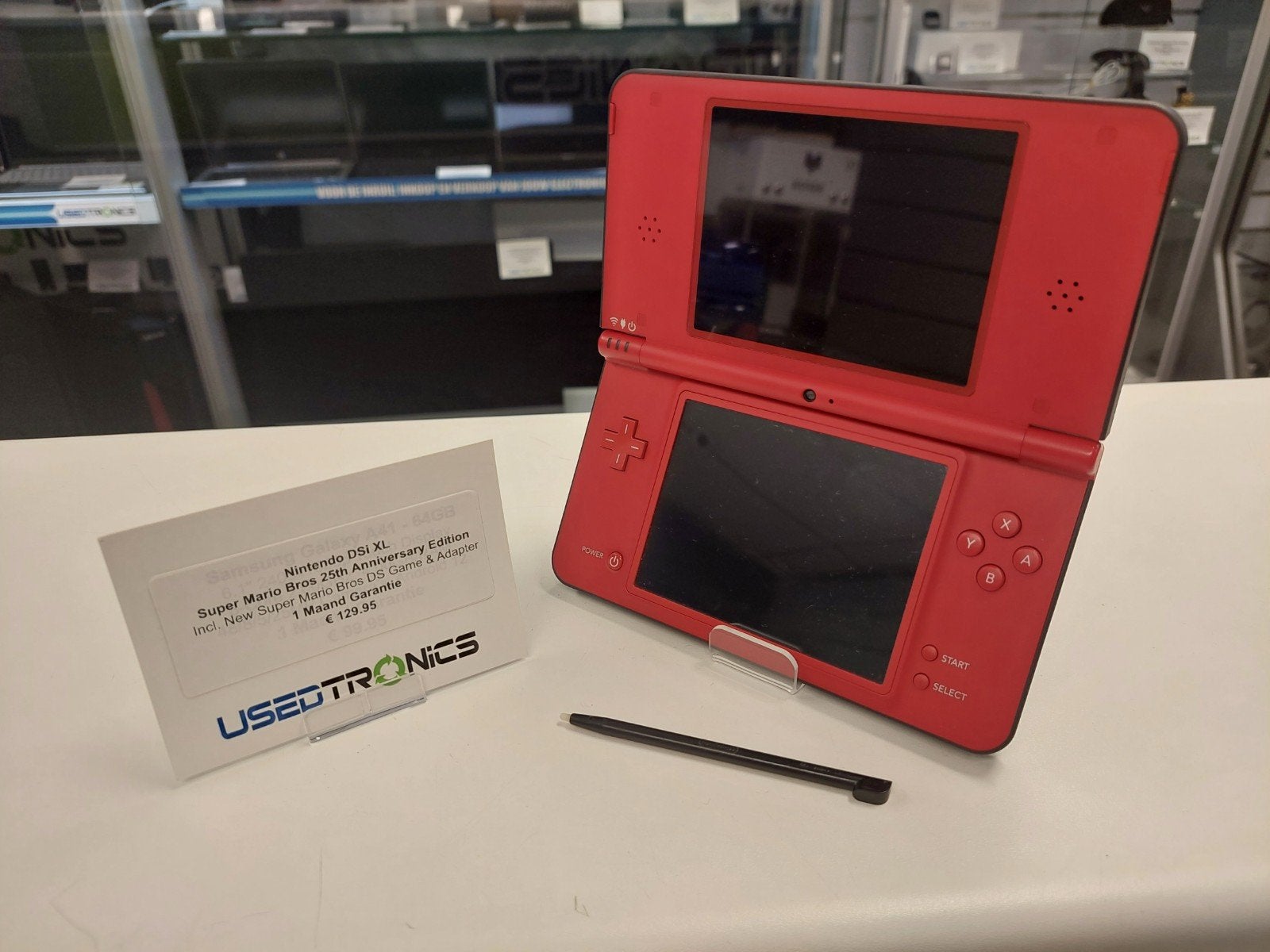 NintendoDSi XL Rood 25th Anniversary Edition + New Super Mar, Dsi XL, Met games, Ophalen of Verzenden, Zo goed als nieuw