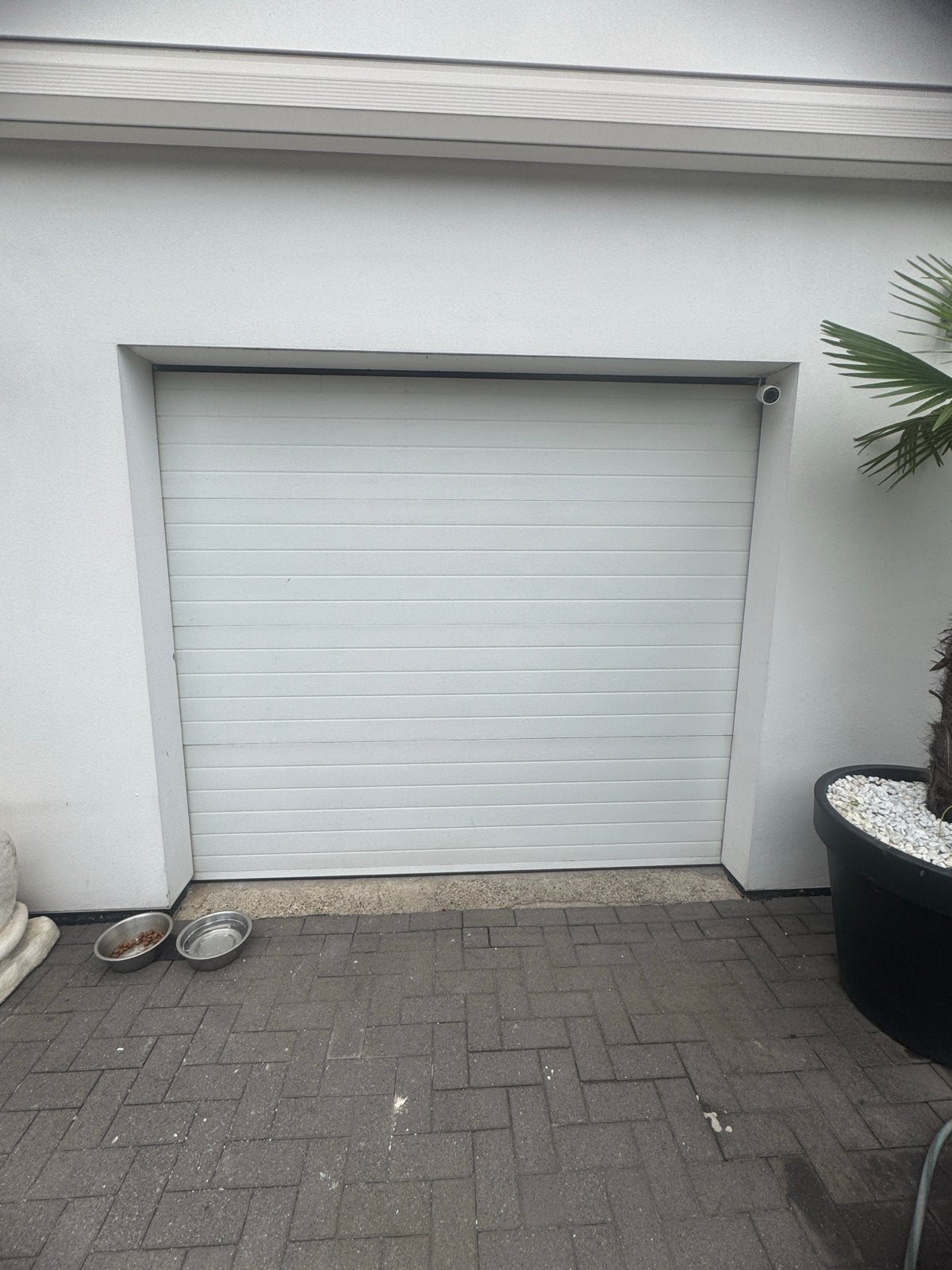 Elektrische sectionale garagedeur, Ophalen