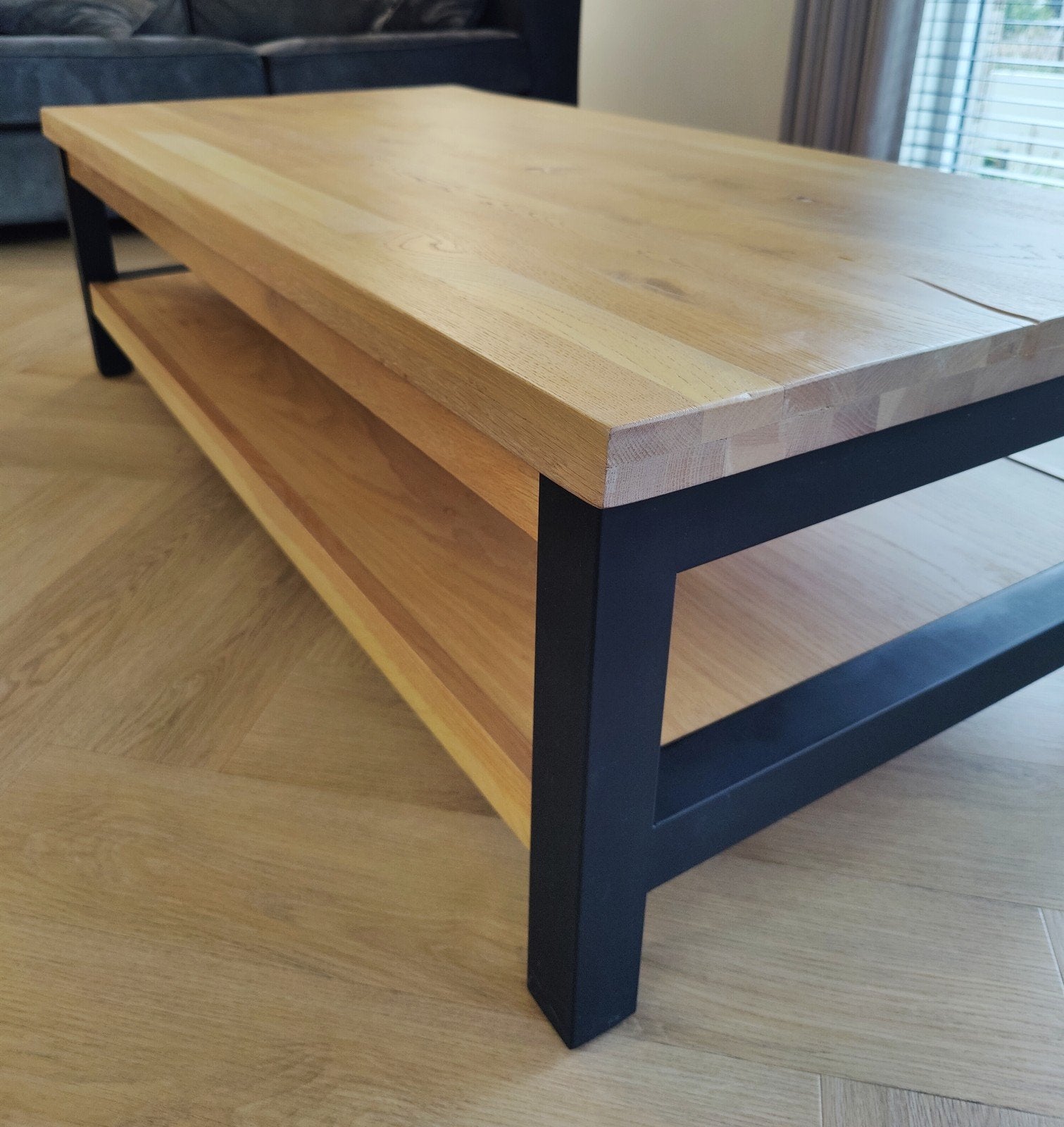 Goossens Santos salontafel eiken / zwart metaal (nieuwstaat), Ophalen, 100 tot 150 cm, 50 tot 100 cm, Zo goed als nieuw