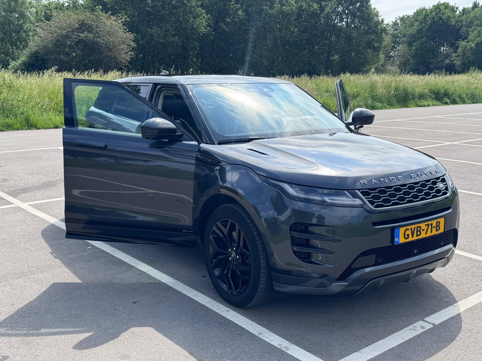 Land Rover Range Rover Evoque P300e 309pk Phev AWD Aut 2021, Auto's, Automaat, Lichtsensor, 1498 cc, Zwart
