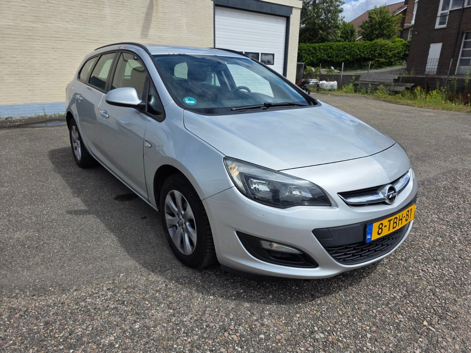 Opel Astra 1.4 Turbo 88KW ST 2014 Grijs, Auto's, Opel, Voorwielaandrijving, Stof, Origineel Nederlands, Handgeschakeld