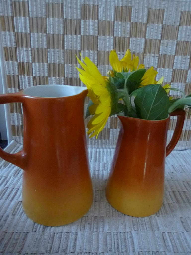 para feu de Sfinx Holland, 2 kannen oranje aardewerk, Verzenden