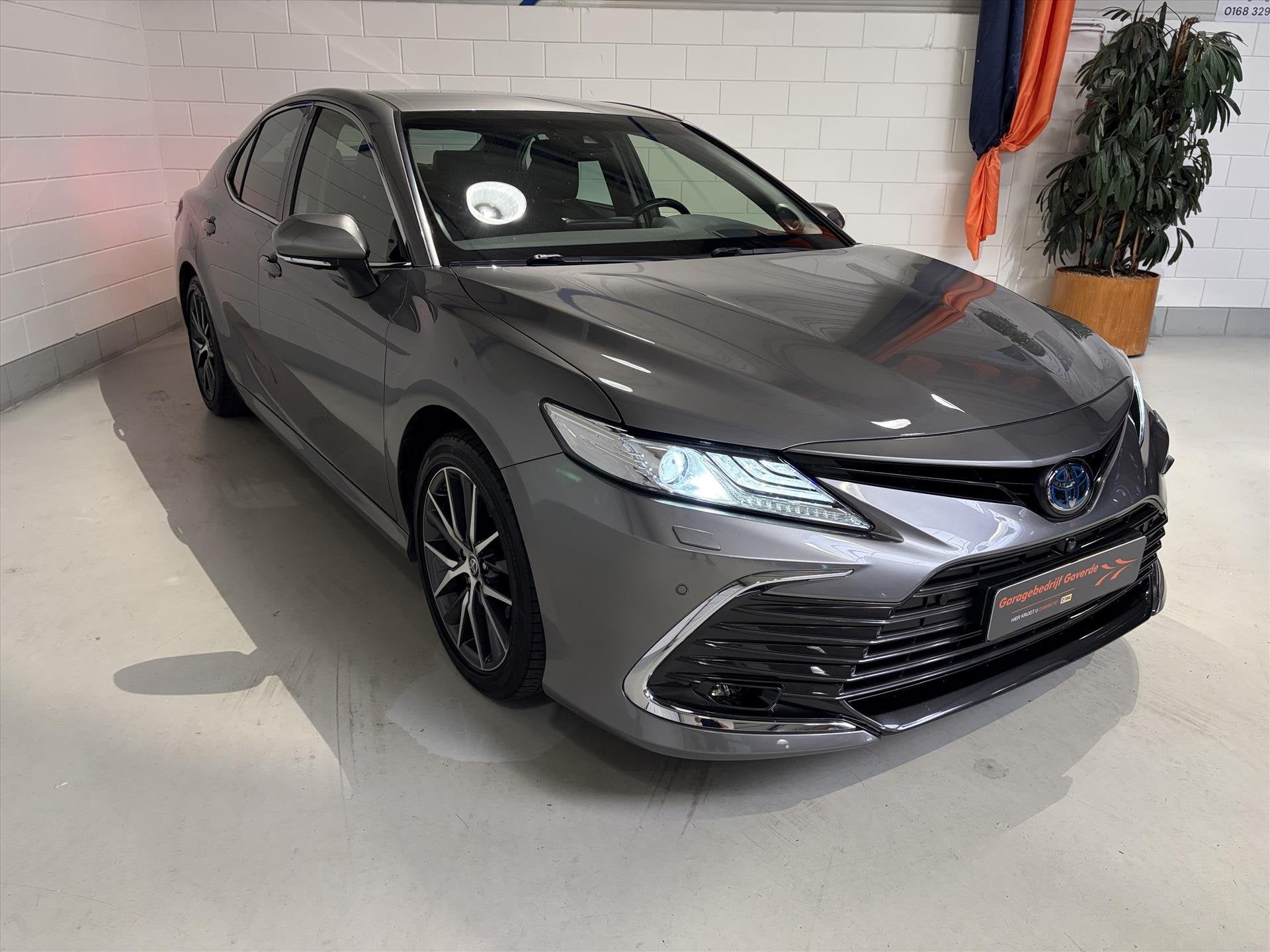 TOYOTA Camry 2.5 Hybrid 218pk Aut Premium ACC, Head-up, Memo, Auto's, Dealer onderhouden, Gebruikt, 4 cilinders, 2487 cc