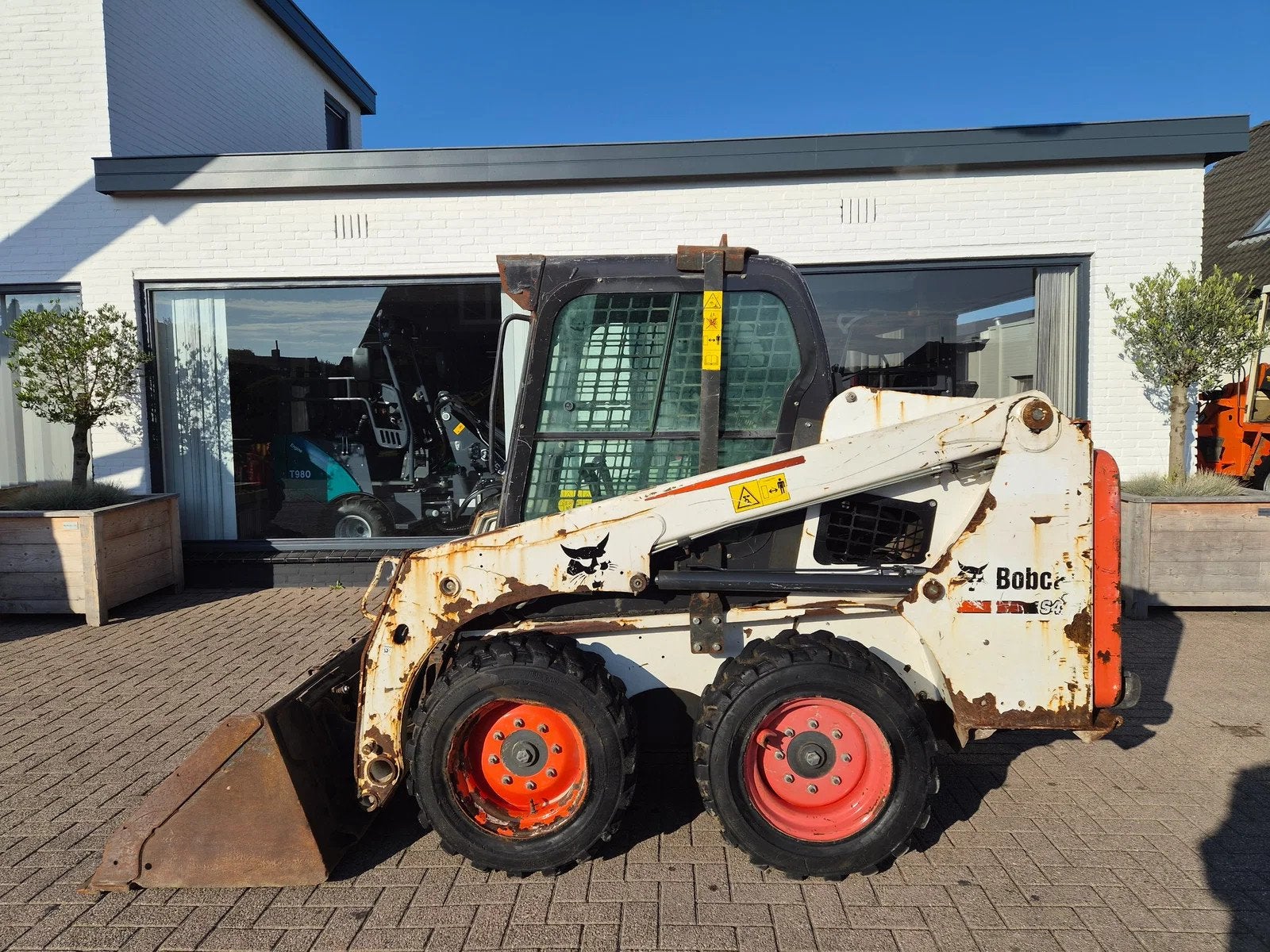 Bobcat S450 schranklader 750 orginele draaiuren (bj 2016), Wiellader of Shovel