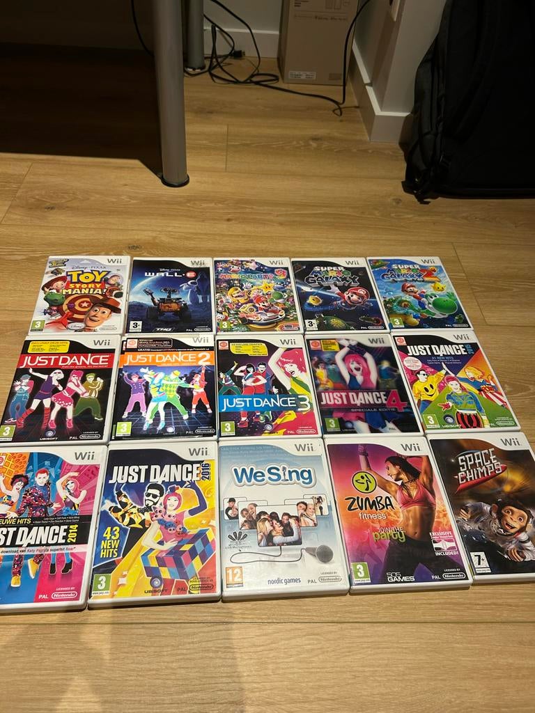 15 Nintendo Wii spellen, Ophalen of Verzenden, Zo goed als nieuw, Zonder controller, Met games