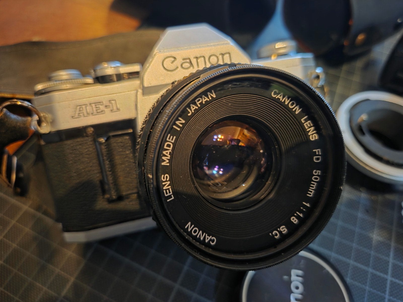 Canon AE1 met 3 lenzen, voorzetlenzen en accessoires