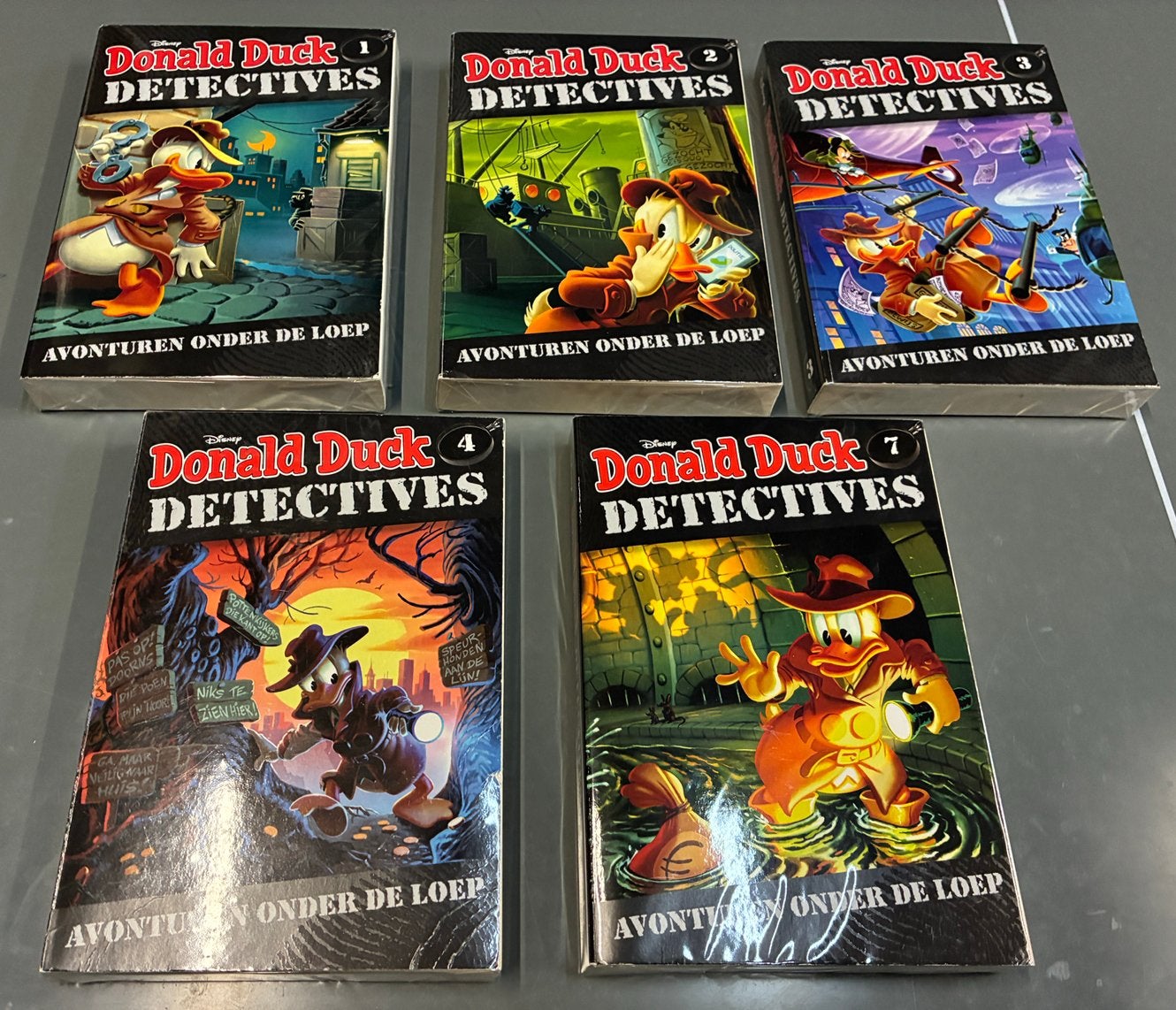 Donald Duck Detectives 1 - 2 - 3 - 4 - 7, Boeken, Meerdere comics, Ophalen of Verzenden, Zo goed als nieuw, Europa