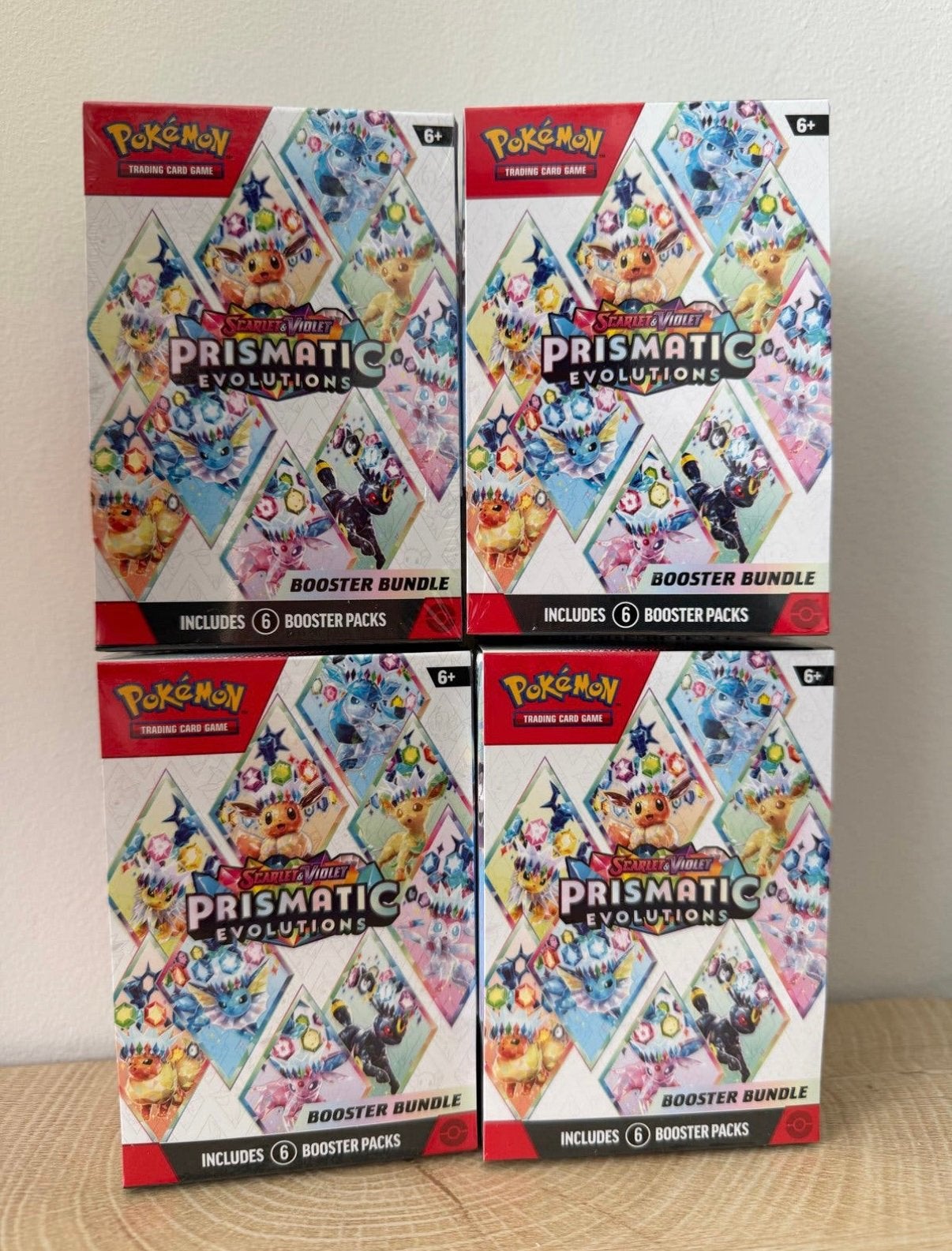 Pokémon Prismatic Evolutions Booster Bundle, Hobby en Vrije tijd, Verzamelkaartspellen | Pokémon, Ophalen, Nieuw, Booster