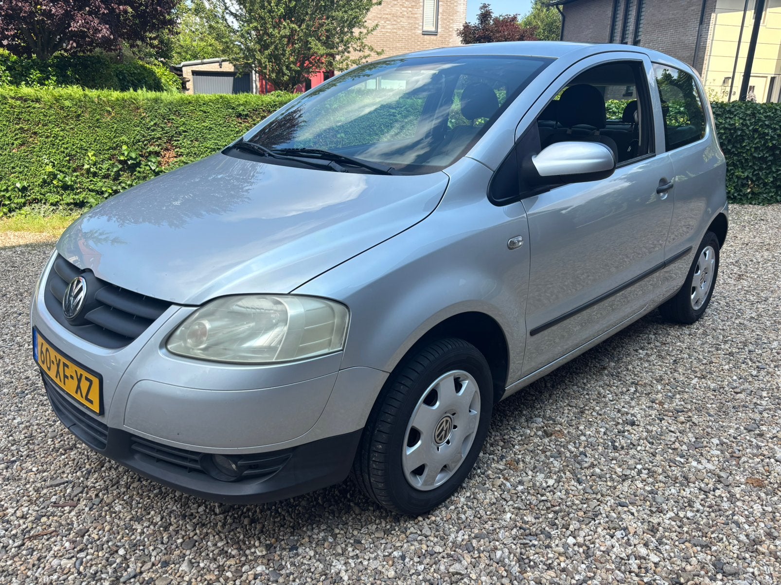Volkswagen Fox 1.4 55KW 2007 Grijs, Auto's, Voorwielaandrijving, 15 km/l, Zwart, 4 stoelen