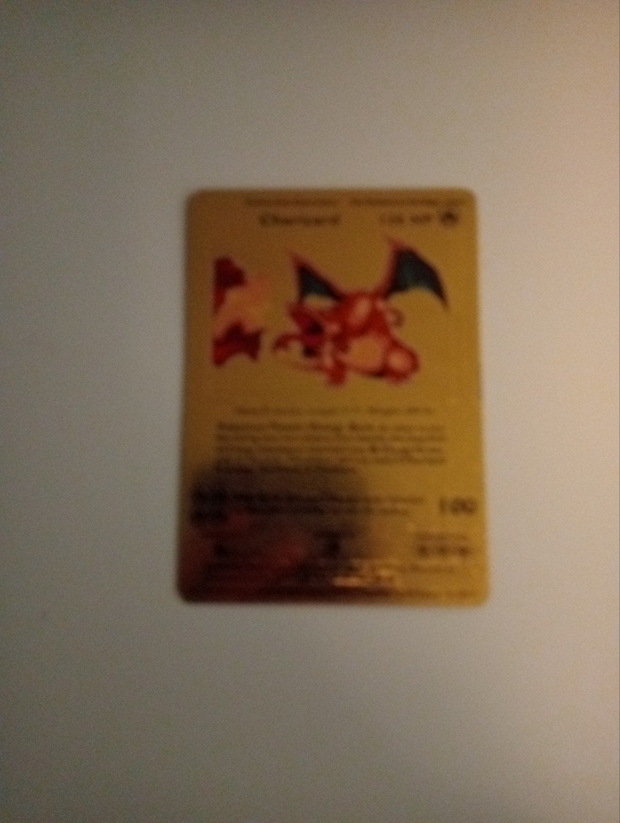 Gouden Charizard Pokémon kaart, Ophalen of Verzenden, Zo goed als nieuw, Losse kaart, Foil