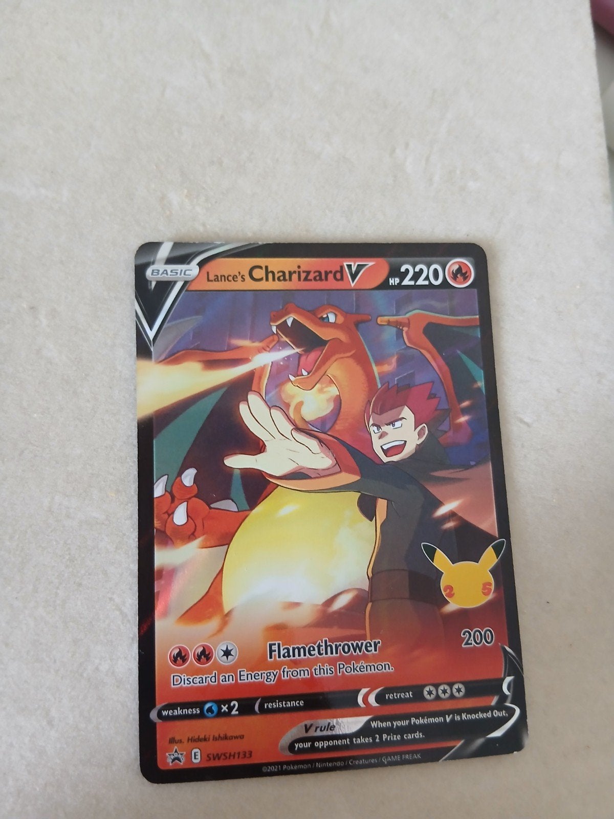 Lance's Charizard V SWSH133 Pokémon Kaart Celebrations, Ophalen of Verzenden, Zo goed als nieuw, Losse kaart