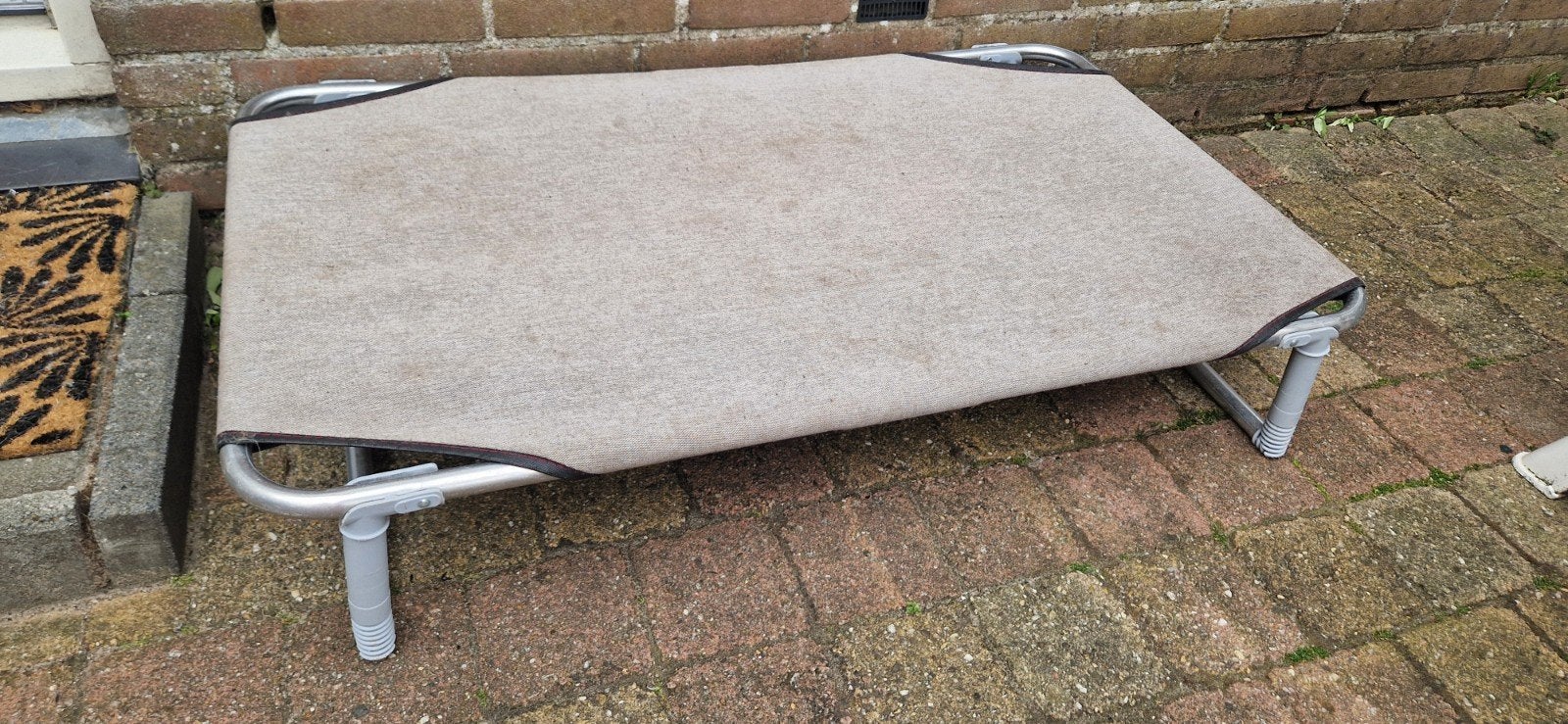 Stretchbed hond, Ophalen