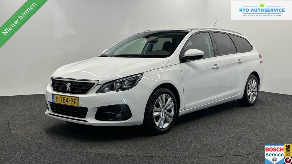 Peugeot 308 SW 1.2 PureTech Blue Lease Executive PANO-APPLE, Auto's, Voorwielaandrijving, Gebruikt, Euro 6, 1199 cc
