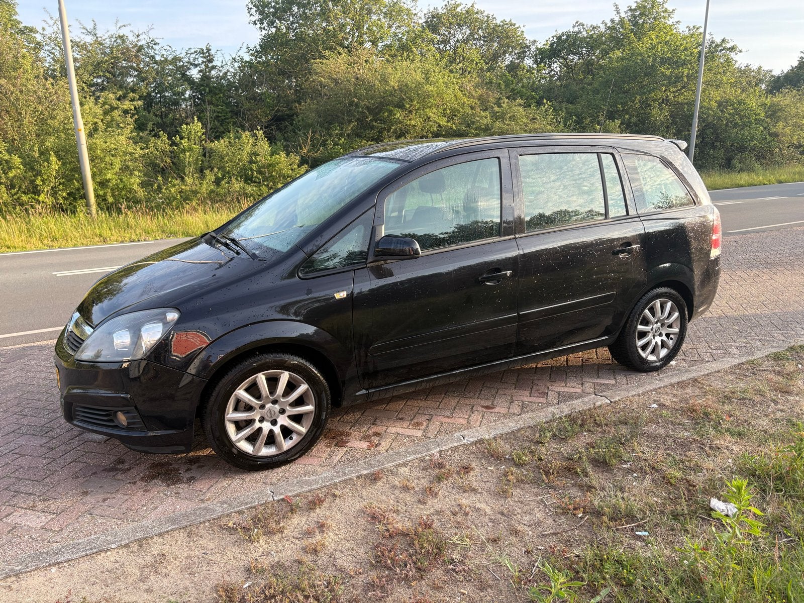 Opel Zafira 1.8 2007 Zwart, Auto's, Stof, Zwart, 4 cilinders, Zwart